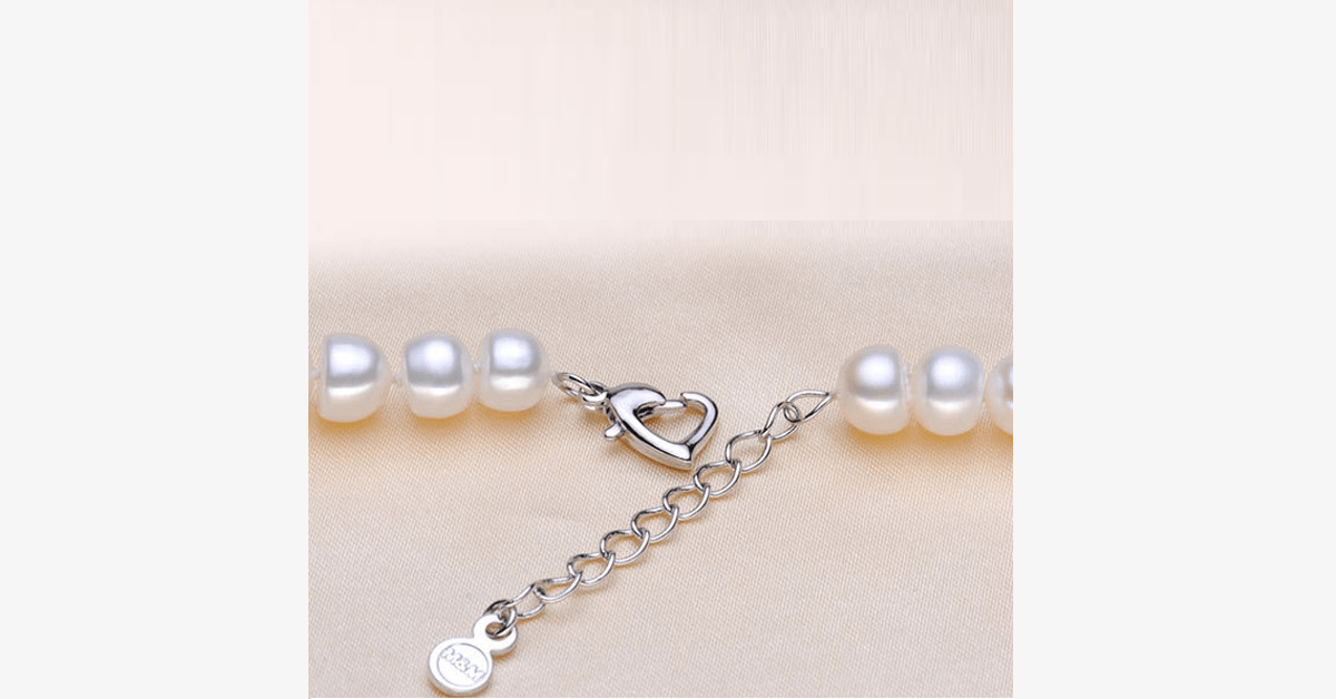 Silver And Pearl Bracelet