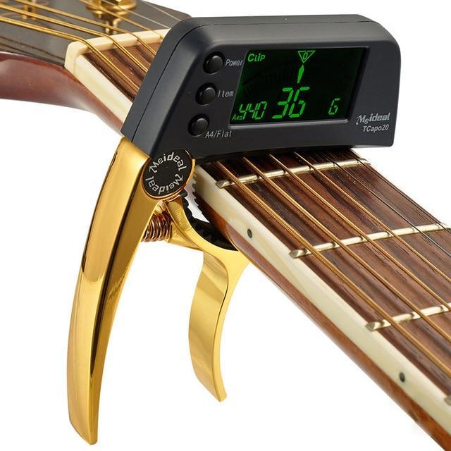Guitar Capo With Built-In Tuner